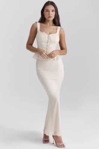 Top peplum de algodón con bordado inglés «Vaqueros Vintage Cream»