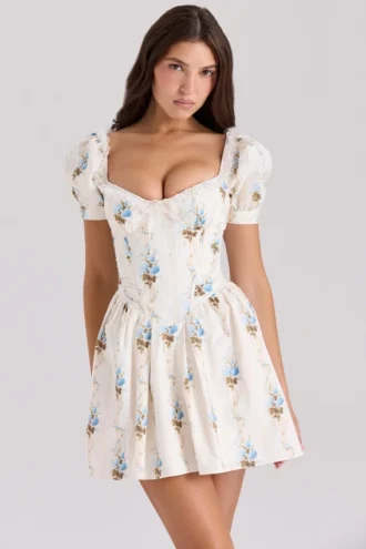 Vestido de algodón con estampado floral Issa en color crema