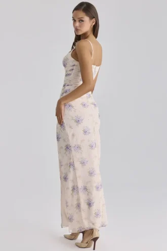 Vestido largo de malla elástica con estampado de peonías de Lini en color marfil